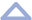 An icon of a hollowed out triangle facing upwards